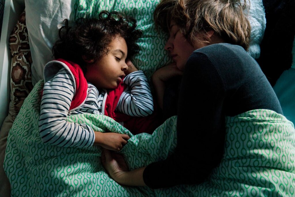 London Family Photographer's self-portrait of her sleeping with her child.