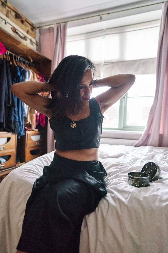 What to wear to your professional headshot photo session also depends on the story you want to tell, like this woman who is wearing a sari to show how she relates to her culture. 
