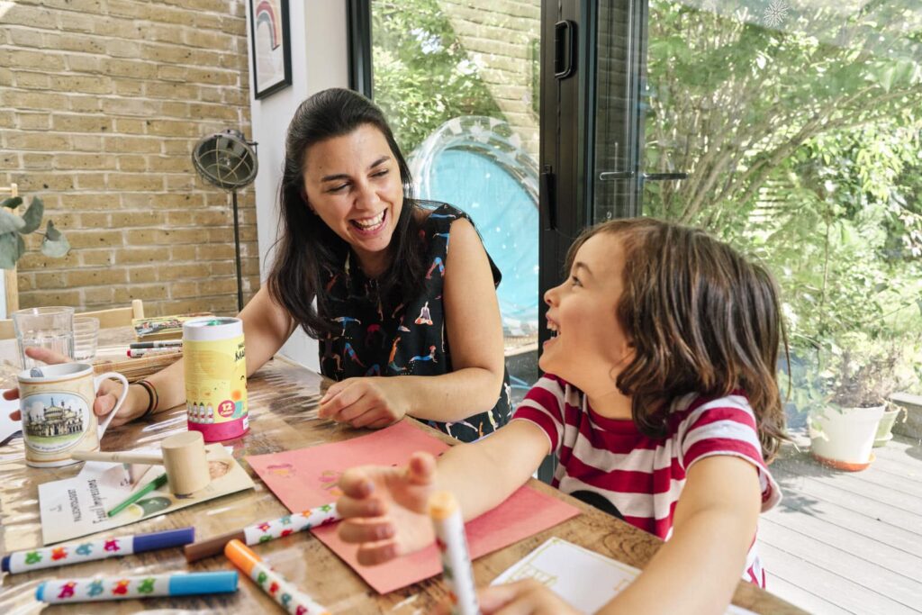 Mother and son laughing together genuinely, are the photos that will make us feel good. 